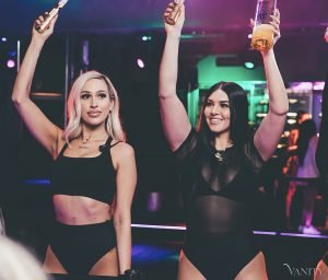 Happy Girls with Arms Up