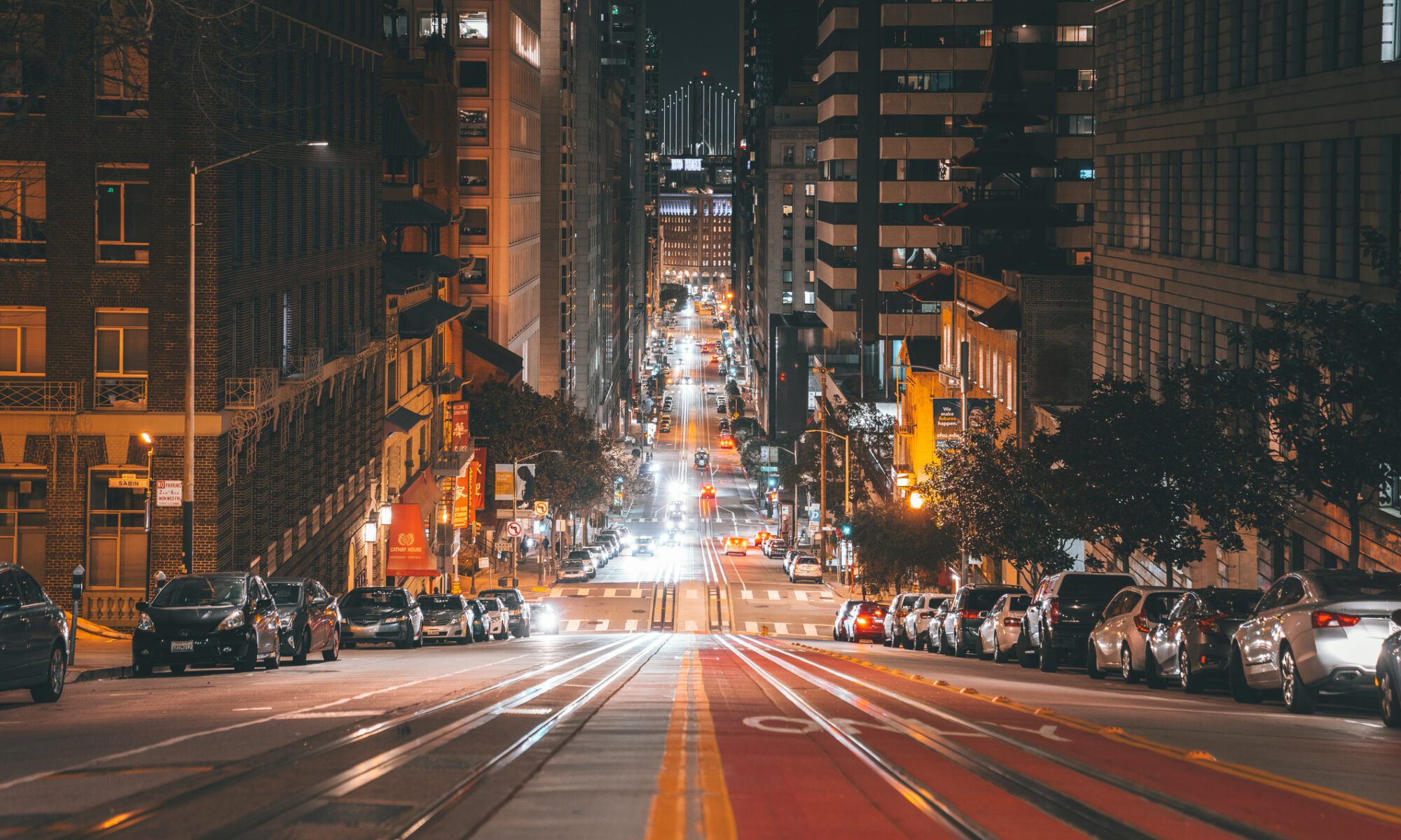 San Francisco California Street with Bay Bridge in background